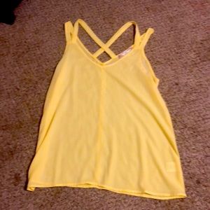 Ladies yellow tank cris- cross back detail